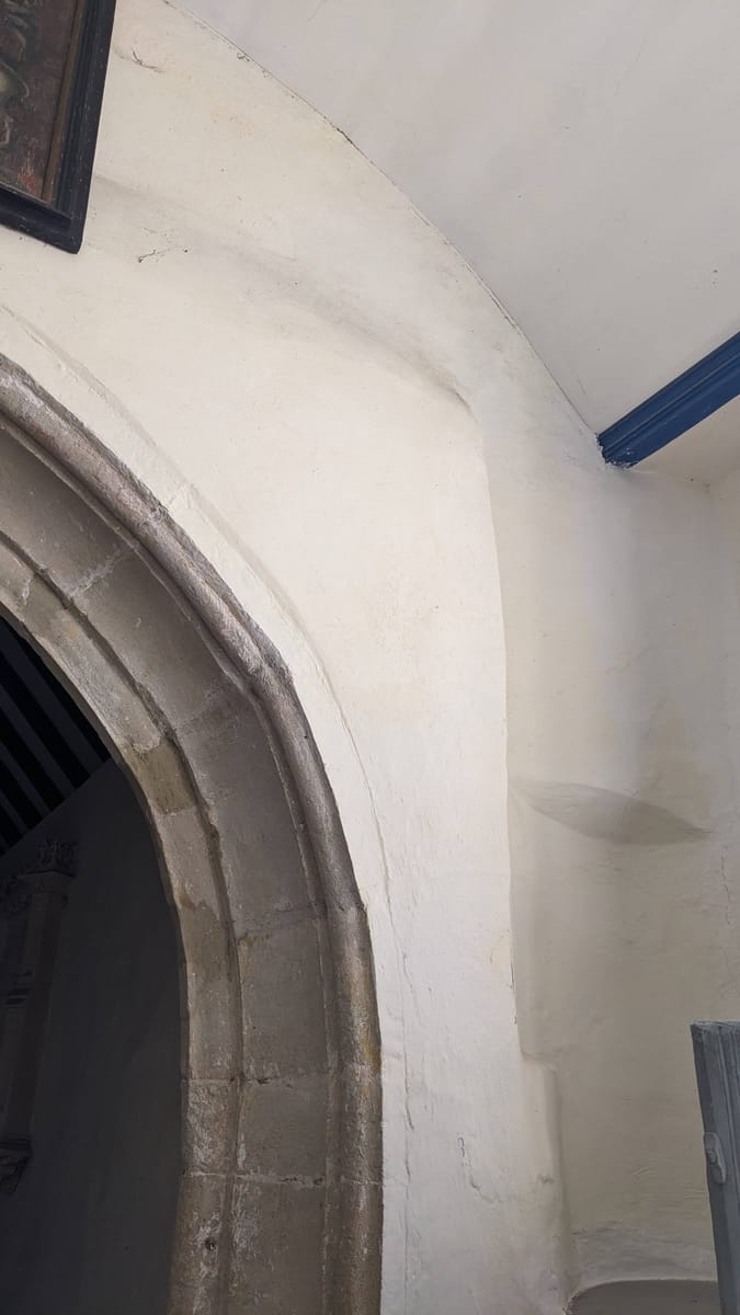 The indication of possible remains of a Rood Screan
